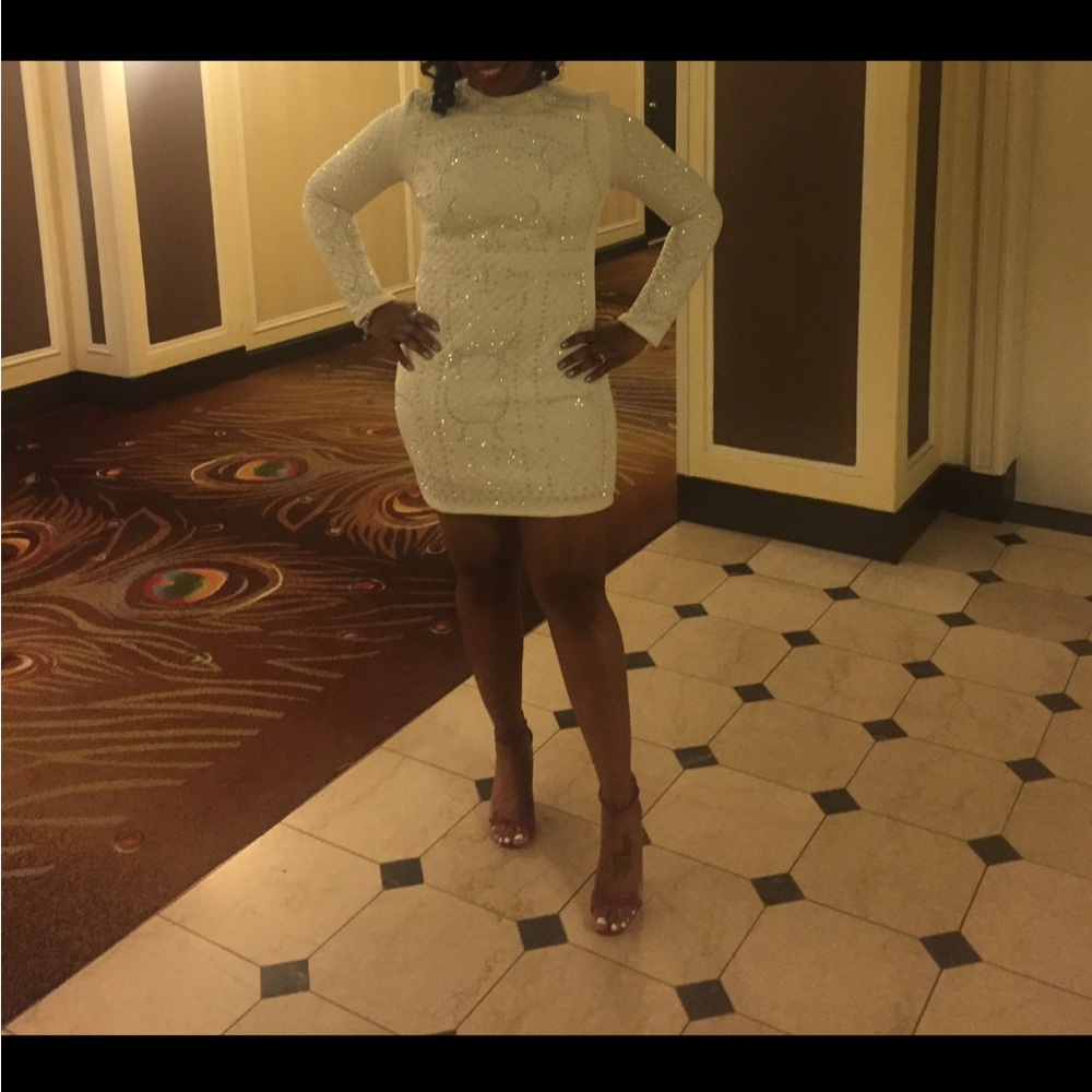 Super cute white dress.